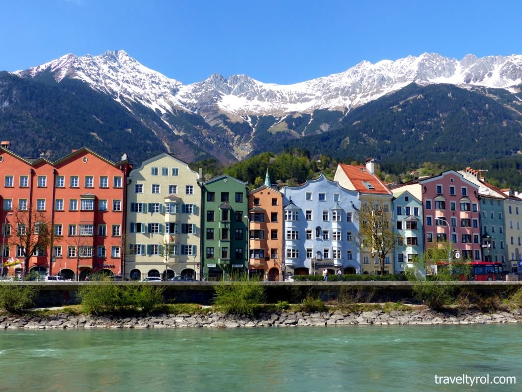 Premium Photo | Innsbruck austria colorful houses by the river at dusk